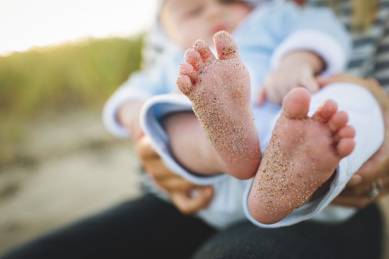Doctor caring for infant during medical consultation