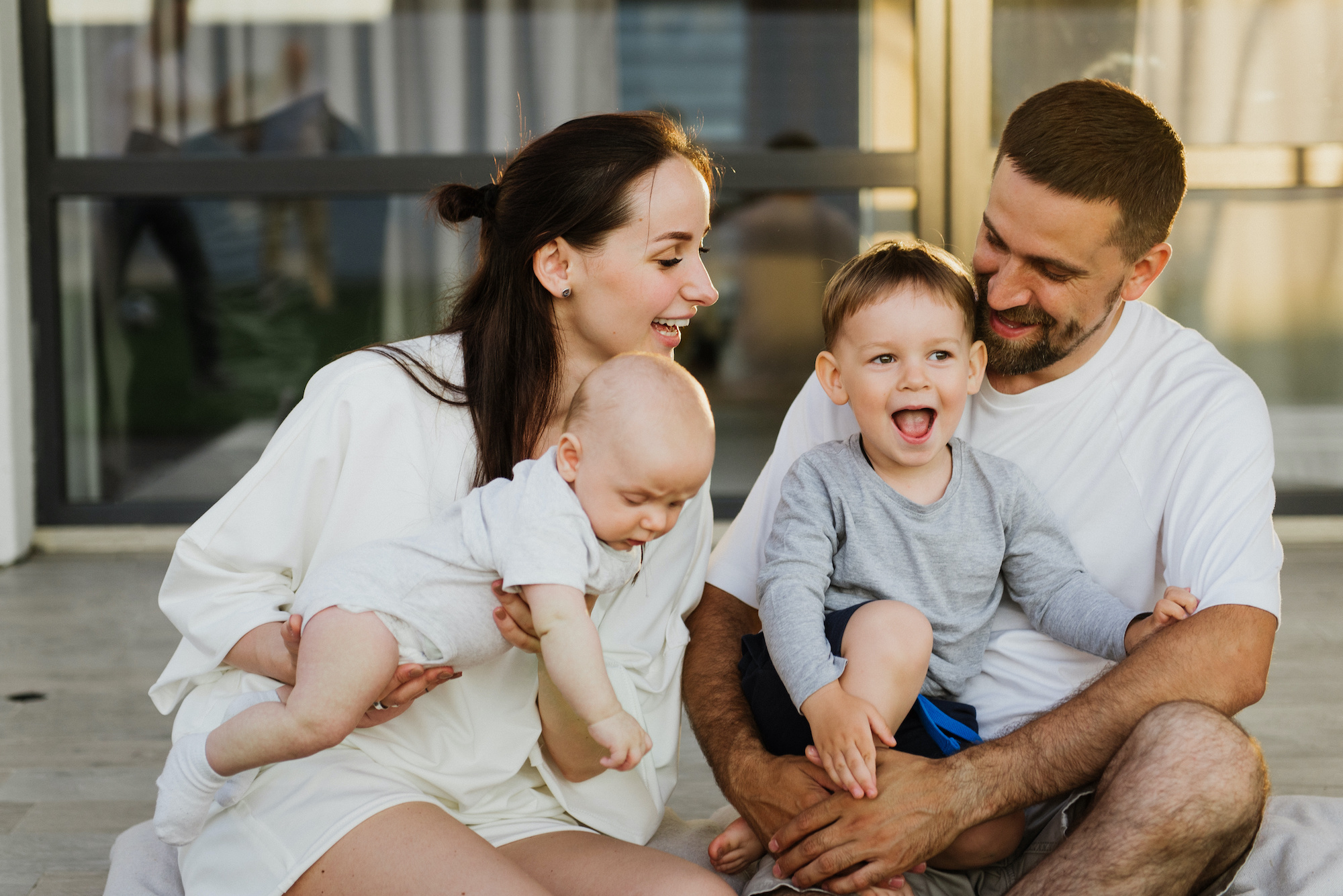 Family caring for each other after baby circumcision procedure